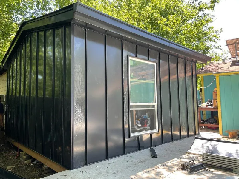 Black standing seam metal wall panels for Roof Inspection in Hesperia